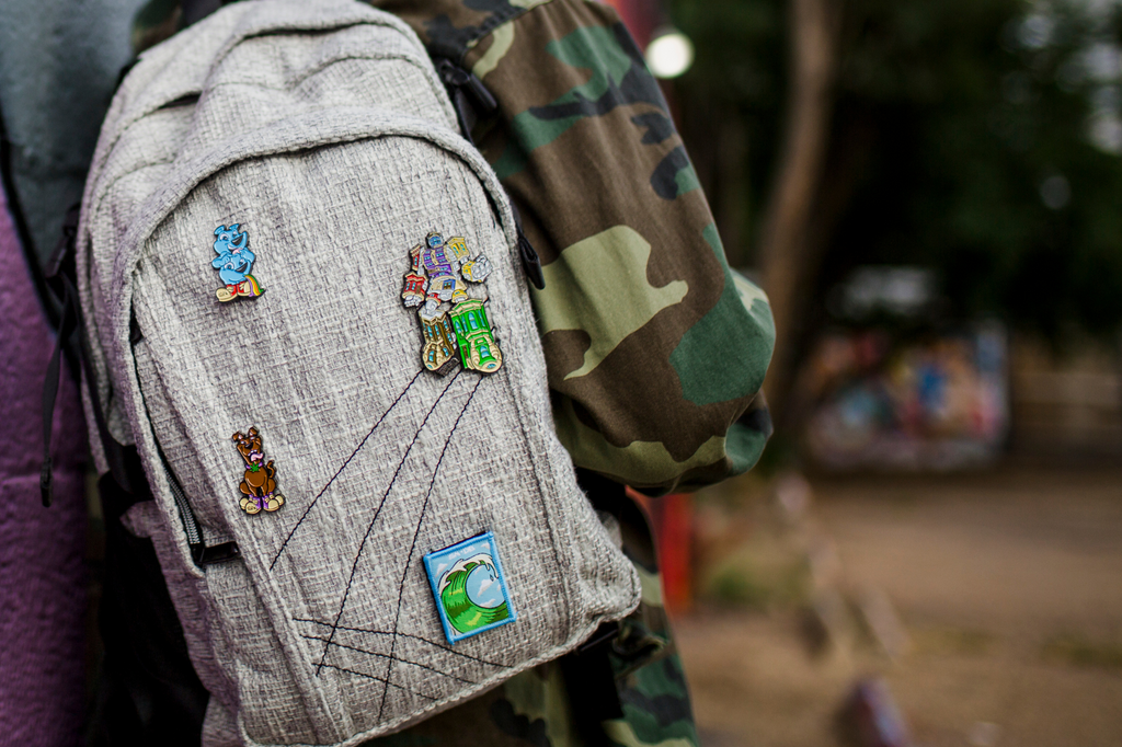 Dime Bags Sirron Norris Hat Pins featured on a Hemp Backpack.